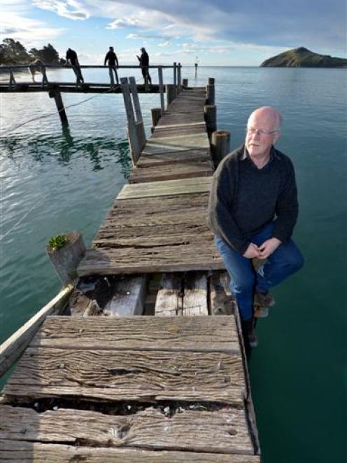 Aramoana League secretary John Davis hopes the pilot's wharf at the township can be saved. Photo...