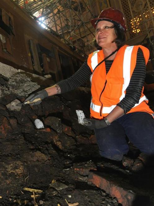 Archaeologist Angela Middleton with some of the pieces unearthed under the Regent Theatre's...