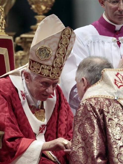 Archbishop of the Byzantine Catholic Archdiocese of Pittsburgh, William Charles Skurla (right)...