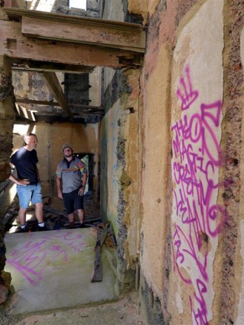 Cargill's Castle Trust chairman Steven De Graaf (left) and Graffiti Doctor (Otago) owner and...