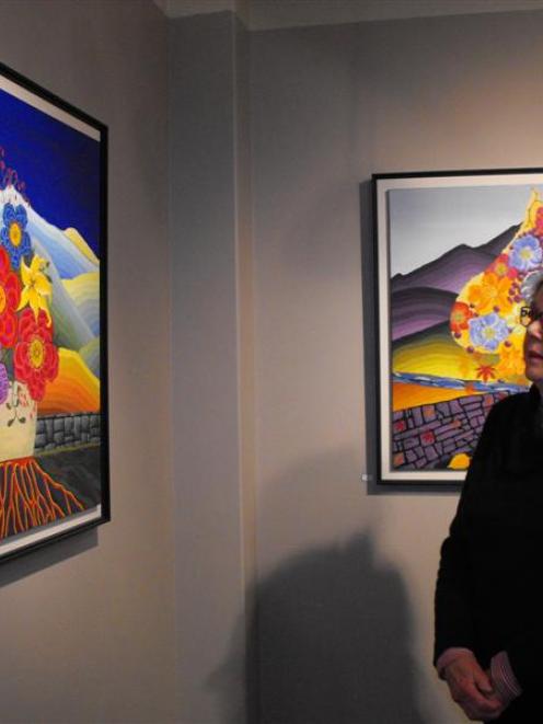 Arrowtown artist Pat Jones stands by one of the works in her "Corridors and Passages" exhibition,...