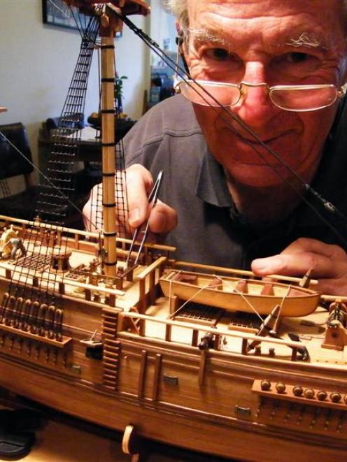 Arrowtown model maker extraordinaire John Harrison at work on his latest project, an  800mm long...