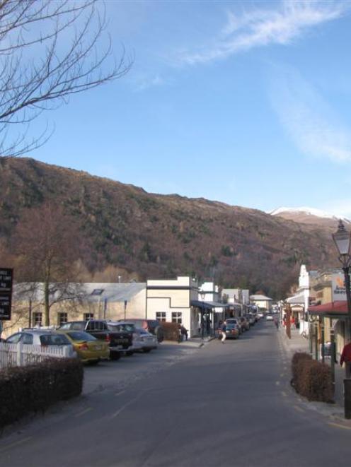 Arrowtown's Buckingham St, the site where the historic Otago Daily Times Arrowtown Today image...