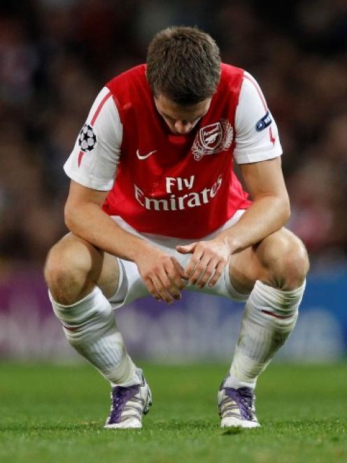 Arsenal's Aaron Ramsey reacts during his team's Champions League Group F match against Marseille...