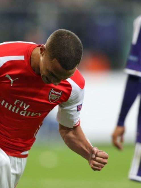 Arsenal's Kieran Gibbs celebrates after scoring against Anderlecht during their Champions League...