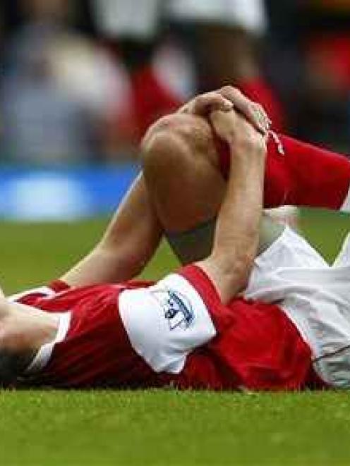 Arsenal's Robin van Persie reacts during the English Premier League soccer match against...