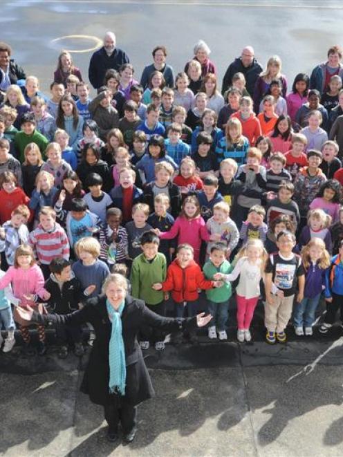 Arthur Street School's new principal Verity Harlick with her pupils on her first day at the...