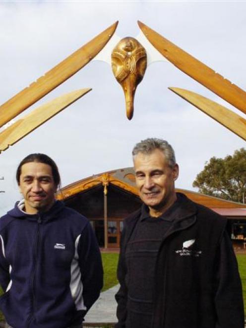 Artist James York (left) and Ross Hemera in front of the entranceway they created at Puketeraki...
