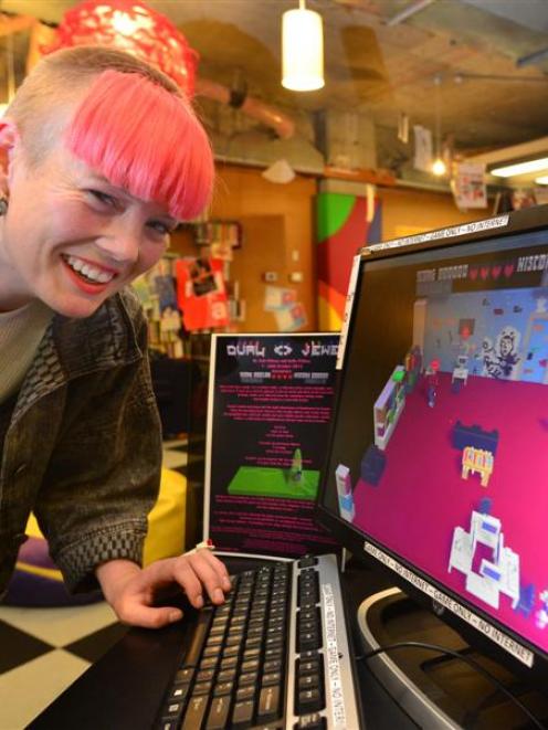 Artist Kelly O'Shea with the portal to her virtual Dunedin, a computer game in the Dunedin...