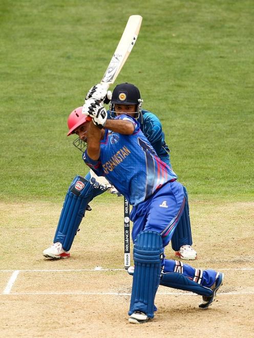 Asghar Stanikzai hits out for Afghanistan against Sri Lanka. Photo: Getty Images