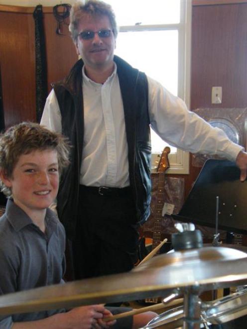 Ashby School of Music pupil Angus Swale (12) relaxes with Trinity College of London examiner...
