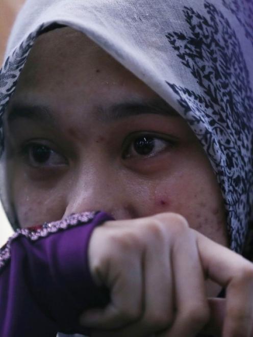 Atikah Abdul Rahman, 20, the niece of Captain Wan Amran, who was on board Malaysia Airlines...