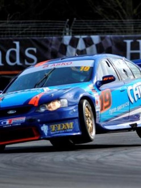 Aussie V8 Super Car driver Shane Van Gisbergen pushes the limit in his Ford Falcon during the...