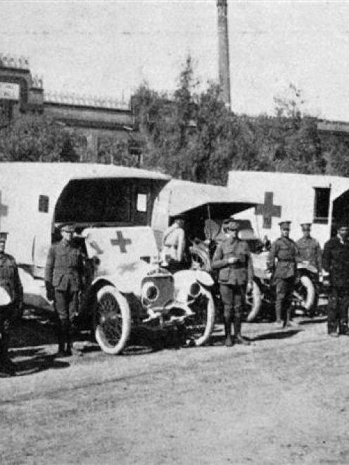 Australasian ambulances awaiting the arrival of a hospital train at Cairo. All are presentation...