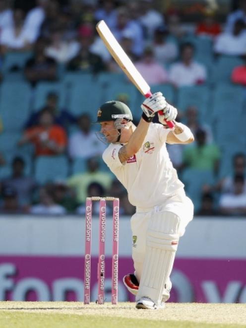 Australia captain Michael Clarke plays a shot in his innings of 47 not out against India during...
