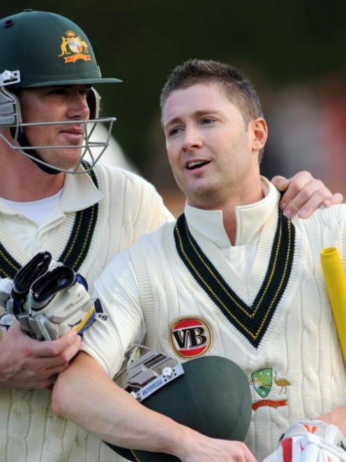 Australia's Marcus North (left) and Michael Clarke celebrate at the end of play against New...