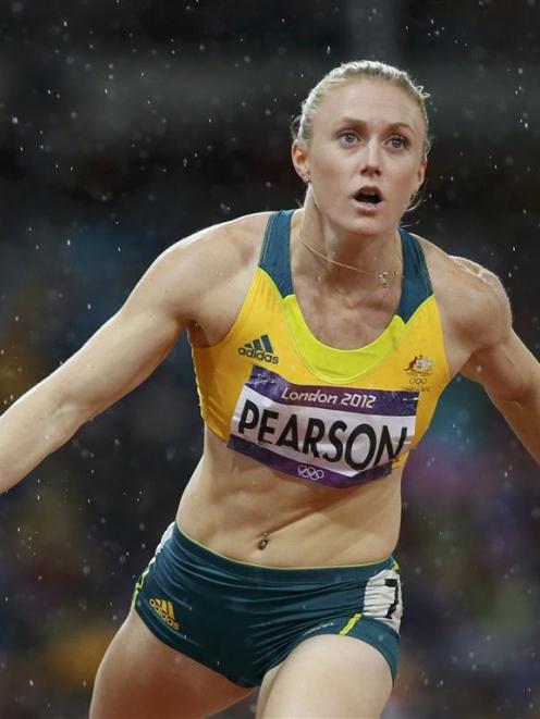 Australia's Sally Pearson wins the women's 100m hurdles final.  REUTERS/Lucy Nicholson