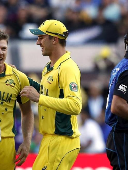 Australia wicketkeeper Brad Haddin (L) celebrates with team-mates James Faulkner (2nd L) and...