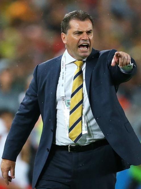 Australian coach, Ange Postecoglou gestures during the 2015 Asian Cup match between Oman and...