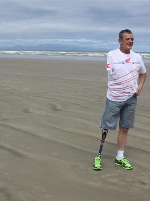 Australian motorcycle racer and double amputee Alan Kempster (top) on Invercargill's Oreti Beach,...
