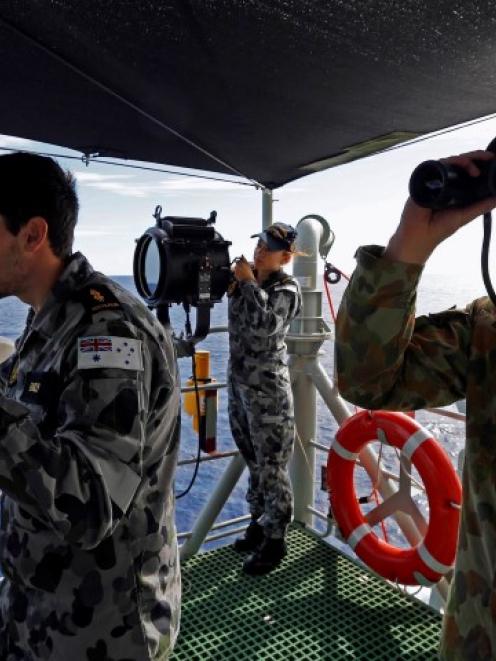 Australian seamen aboard an Australian Navy ship.