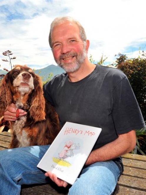 Author David Elliot at home in Port Chalmers with Henry's Map and his dog Molly yesterday. Photo...