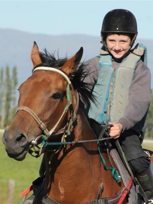 Bailey Kennedy riding Twizel Magic in work at Wingatui yesterday. Photo by Tayler Strong.