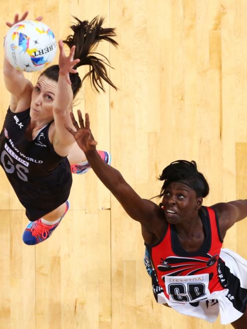 Bailey Mes jumps to compete for the ball in the Silver Ferns win over Trinidad and Tobago. Photo...