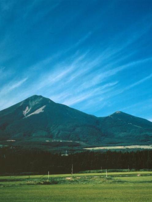 Bandai-san volcano rises to 1800m.
