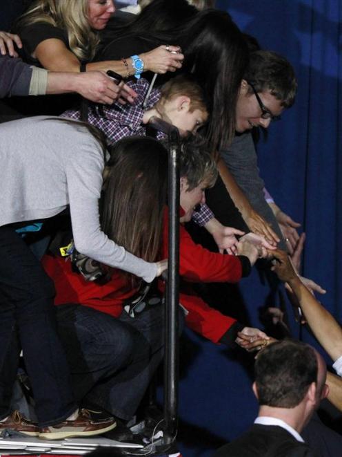 Barack Obama greets supporters during a campaign rally at Mentor High School in Mentor, Ohio....