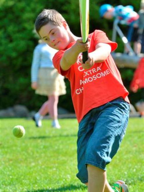 Beau Campbell (11), of Dunedin, strikes out during a game of cricket at the Otago Down Syndrome...