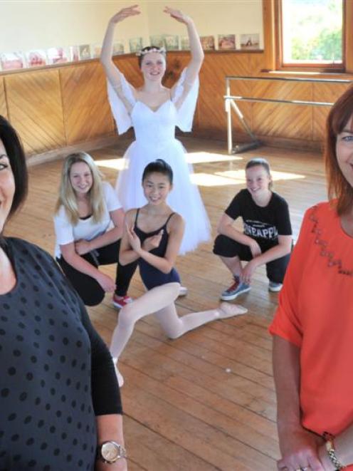 Belinda Shaw (left) and Raewyn Riddell say goodbye to their dance studio and pupils (standing)...