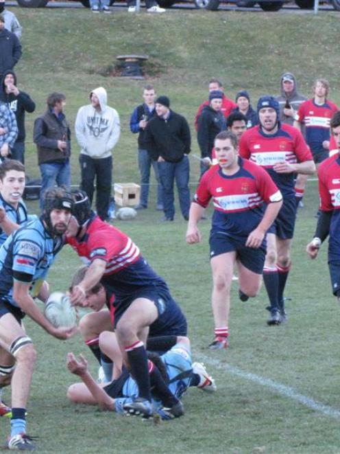 Ben McDonald, of the Wakatipu Premiers, makes a pass  during Saturday's White Horse Cup match....