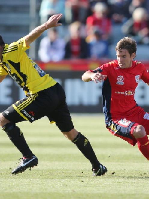 Ben Sigmund in action against Adelaide United.  (Photo by Morne de Klerk/Getty Images)