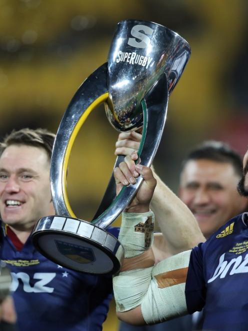 Ben Smith and Nasi Manu of the Highlanders celebrate winning the Super Rugby Title between the...