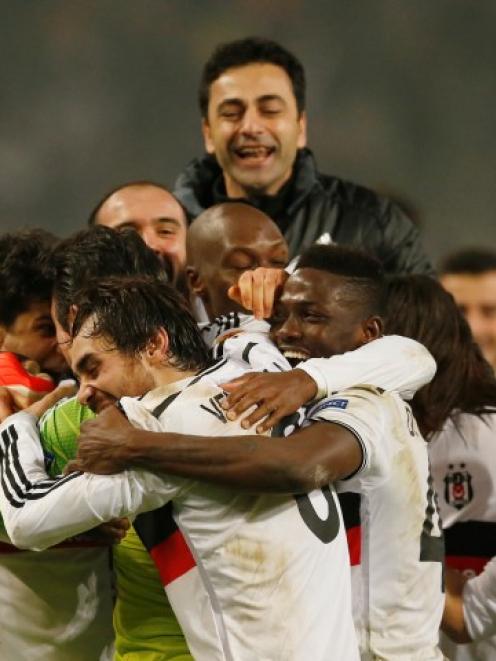 Besiktas players celebrate their win over Liverpool. Photo: Action Images via Reuters / Andrew...