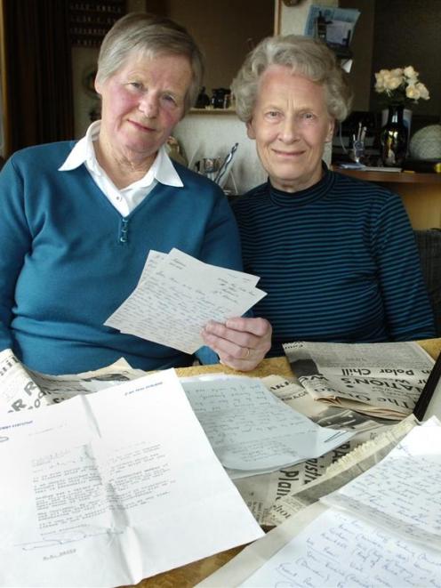 Beverley Moyle (left) and Joan Galbraith with their brother Graham Lucas' last letter to their...