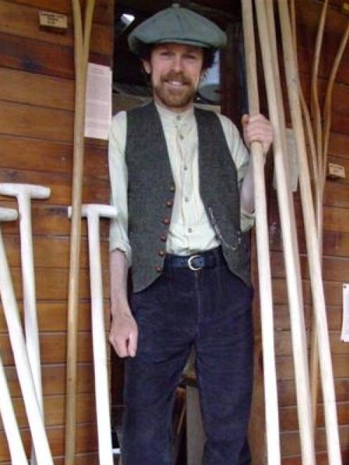 Bill Blair displays traditional grain shovels and bread paddles which will be used as props on...