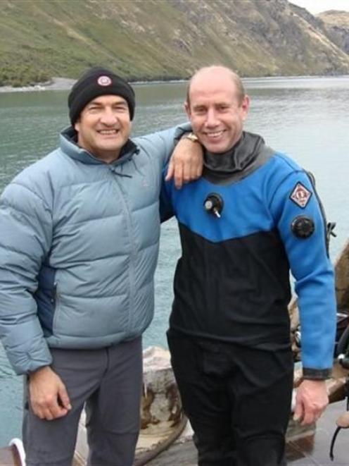 Bill Day (left) and Dr Simon Mitchell during the dive for Haast pilot Morgan Saxton's helicopter...