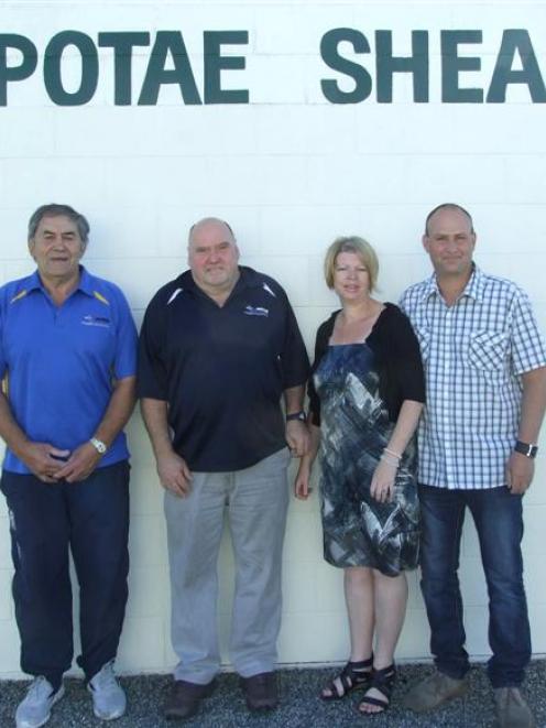 Bill Potae (left), Jim Murdoch and Shara and Jason Davis reflect on the sale of Potae Shearing....