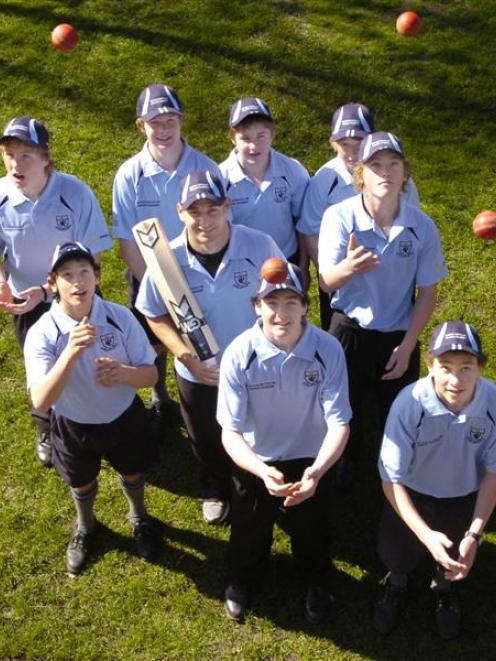 Black Caps and Otago all-rounder Nathan McCullum with some members of the new cricket academy at...