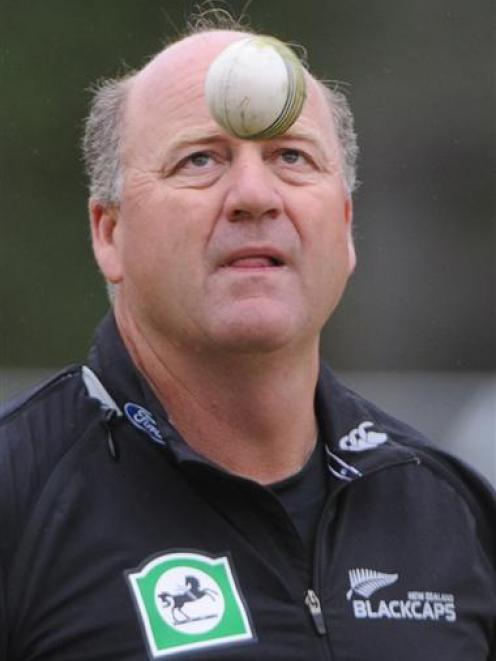 Black Caps coach Mark Greatbatch has his eyes on the ball during team training at Logan Park...