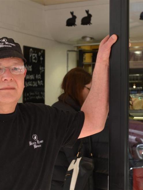 Black Rabbit Bakery owner Shane Ross stands outside his artisan bakery, in George St, before he...