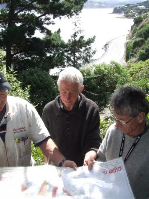 Blueprint: Discussing an old map showing the paper road to be reinstated as a walkway to Company...