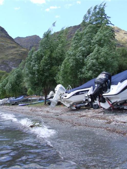 Boats line the shore at Glendhu Bay, Lake Wanaka, where winds have left boaties high and dry....