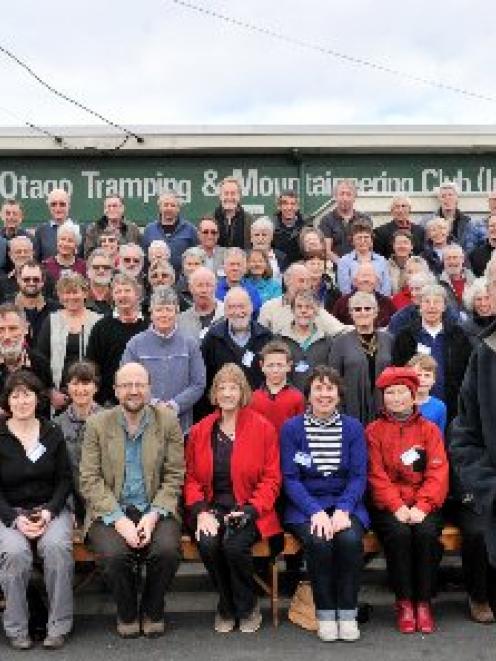 Bob Stables (front, at right) and Otago Tramping and Mountaineering Club members celebrate the...