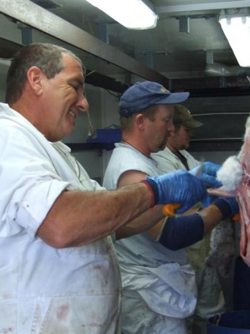 Bob Thomson (left) and Tony Goddard have established a mobile processing plant, turning rabbits...