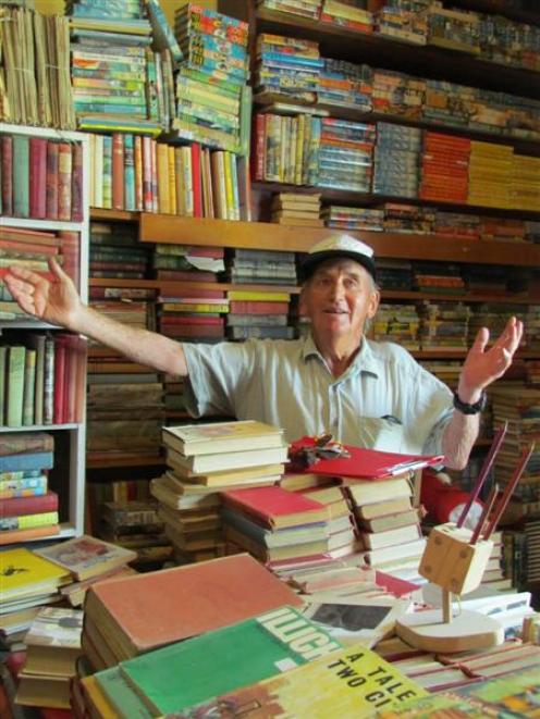 Bob Watherston, from Kurow, tries to organise the extensive Kurow book collection. Photo by...