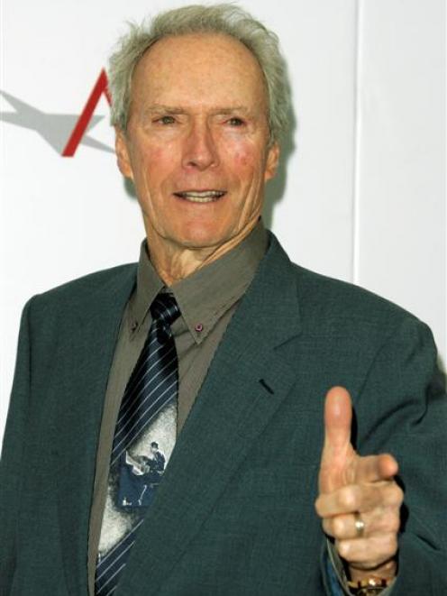 Boldest example of the stardom matrix . . .Clint Eastwood arrives for the American Film Institute...