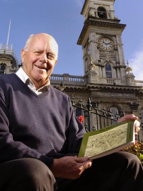 Norman Ledgerwood with his book Heart of a City: the Story of Dunedin’s Octagon.  Photo by Peter...